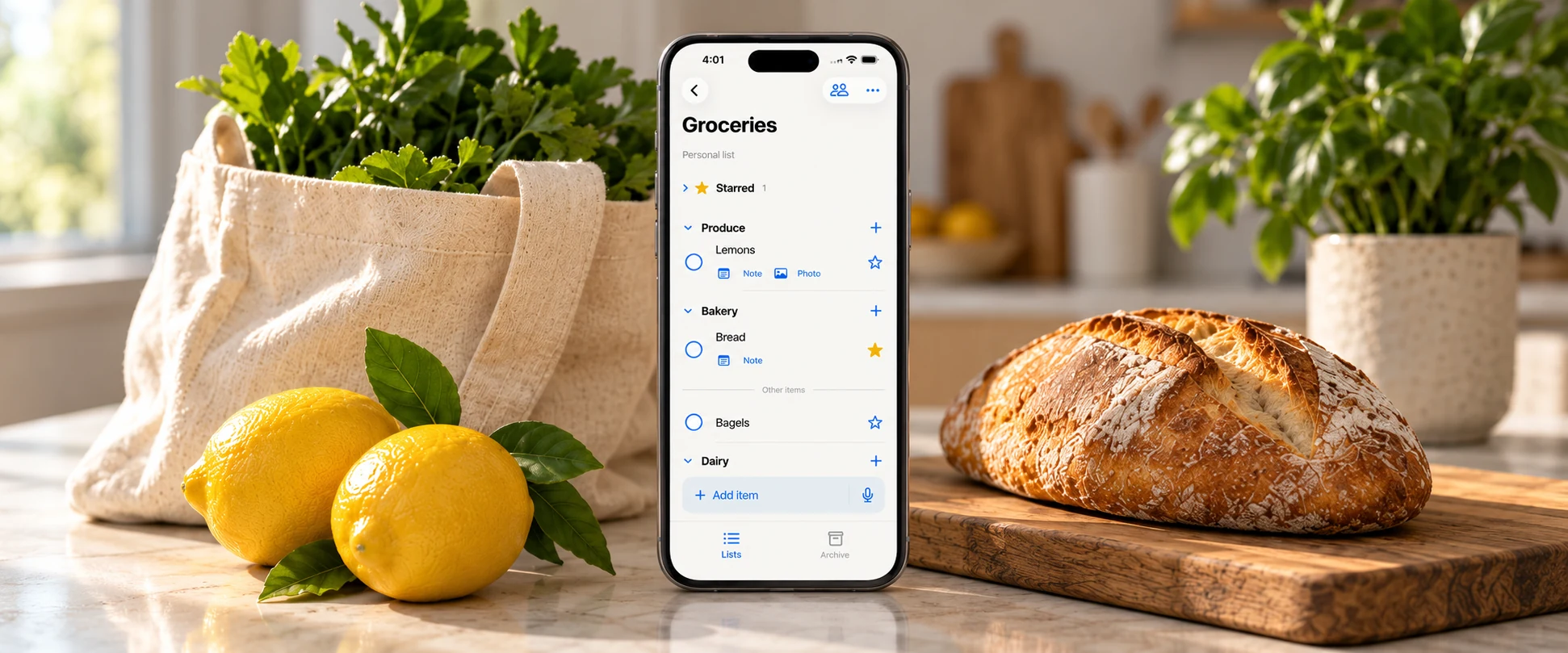 TD List’s grocery list on an iPhone beside a tote, lemons and fresh bread.